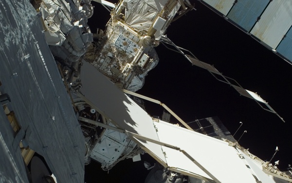 EVA view of the P1 Truss aft radiator and port side of the P6 Truss and Z1 Truss during STS-115 mission