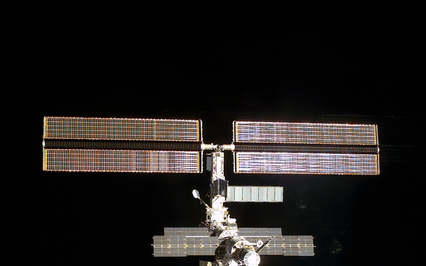 The aft side of the ISS taken during the STS-108 undocking and flyaround