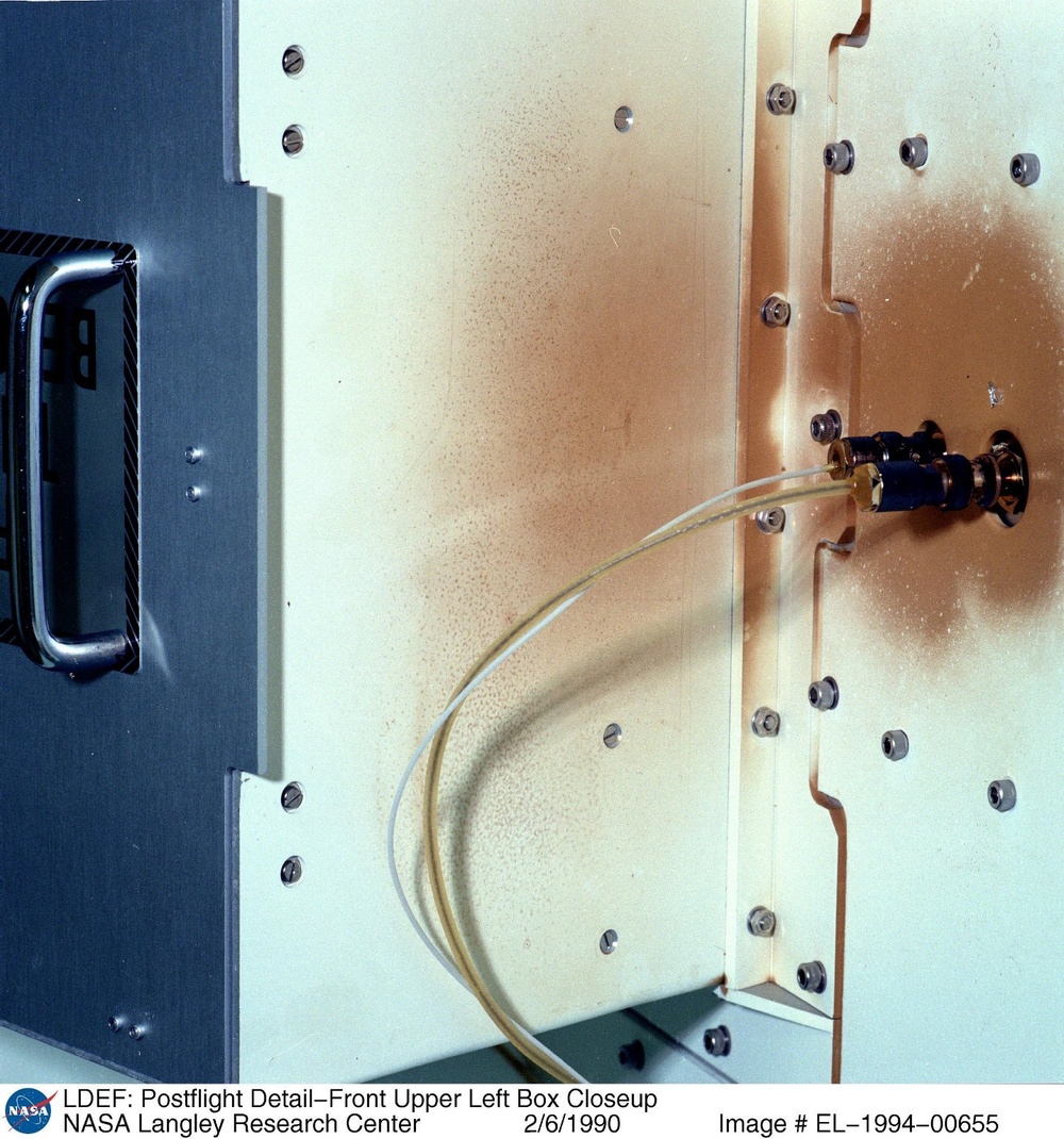LDEF: Postflight Detail-Front Upper Left Box Closeup