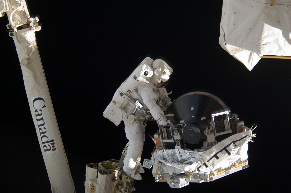 View of MS Williams transporting the new CMG to the ESP2 during EVA 2