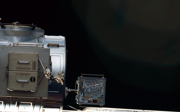 View of the starboard solar arrays for the FGB and Service Module taken during STS-110