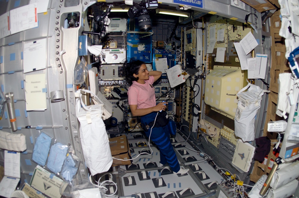 Chawla works at the CM in the SH during STS-107