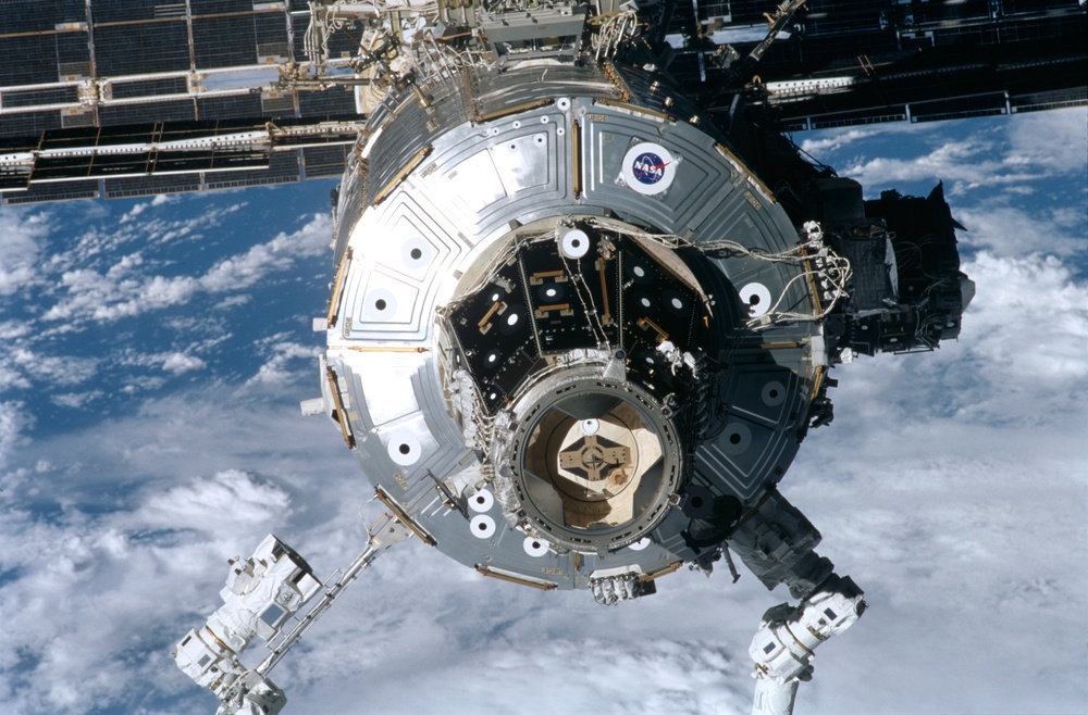 The U.S. Laboratory, PMA2 and SSRMS taken during ISS undocking of the STS-100 mission