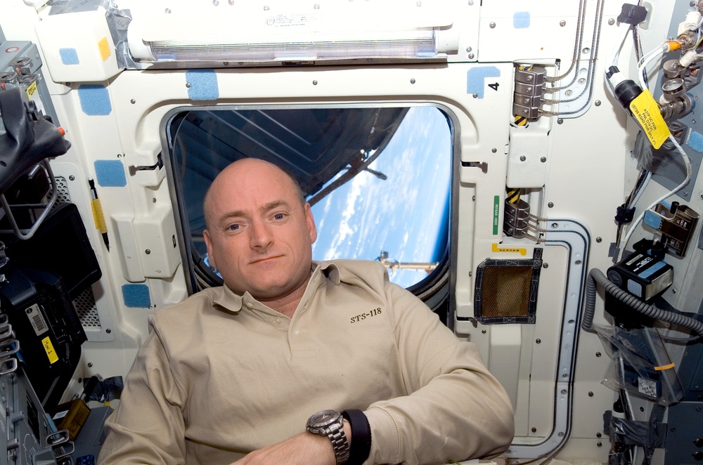 Kelly posing for a photo on the Endeavour during the STS-118 Mission