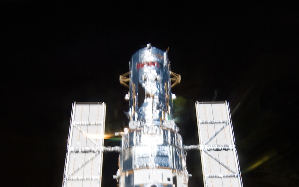 View of HST berthed in Atlantis' Payload Bay
