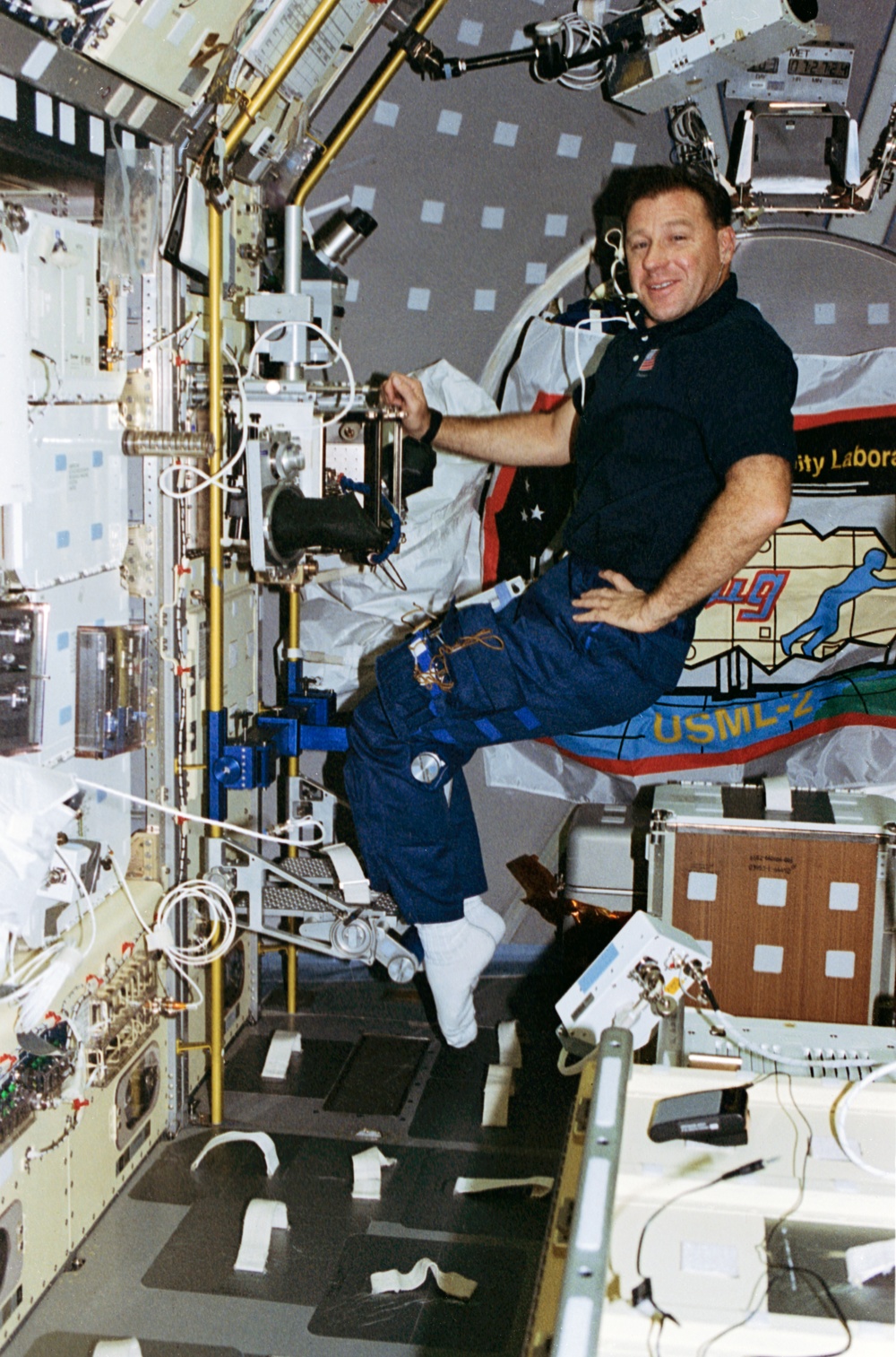 STDCE and Glovebox, Payload Specialist Albert Sacco works in USML-2 Spacelab