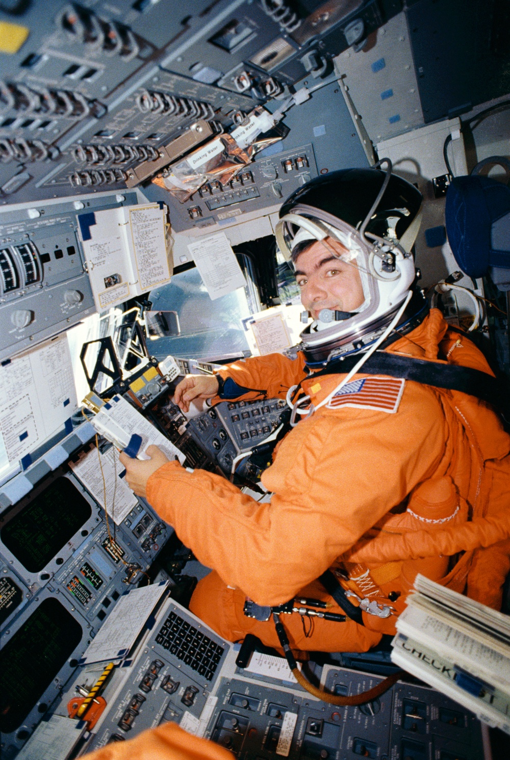 STS-46 Pilot Allen, in LES, at pilots station on OV-104's forward flight deck