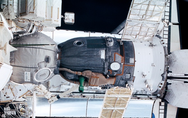 View of the Soyuz and Atlantis' payload bay taken during STS-110's visit to the ISS