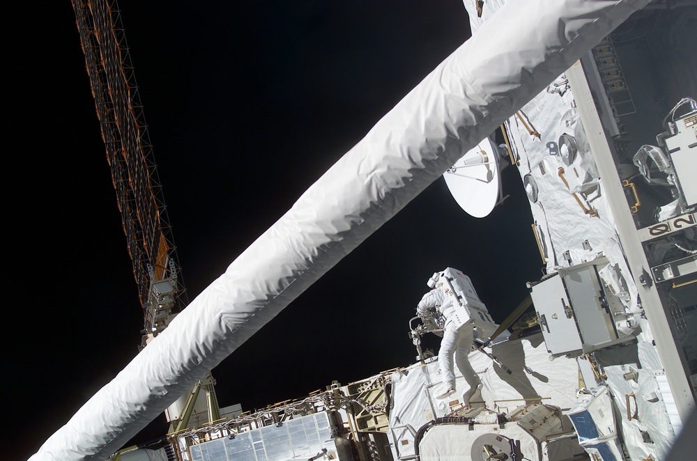 Perrin works with the MBS in Endeavour's PLB during STS-111 UF-2 EVA 1