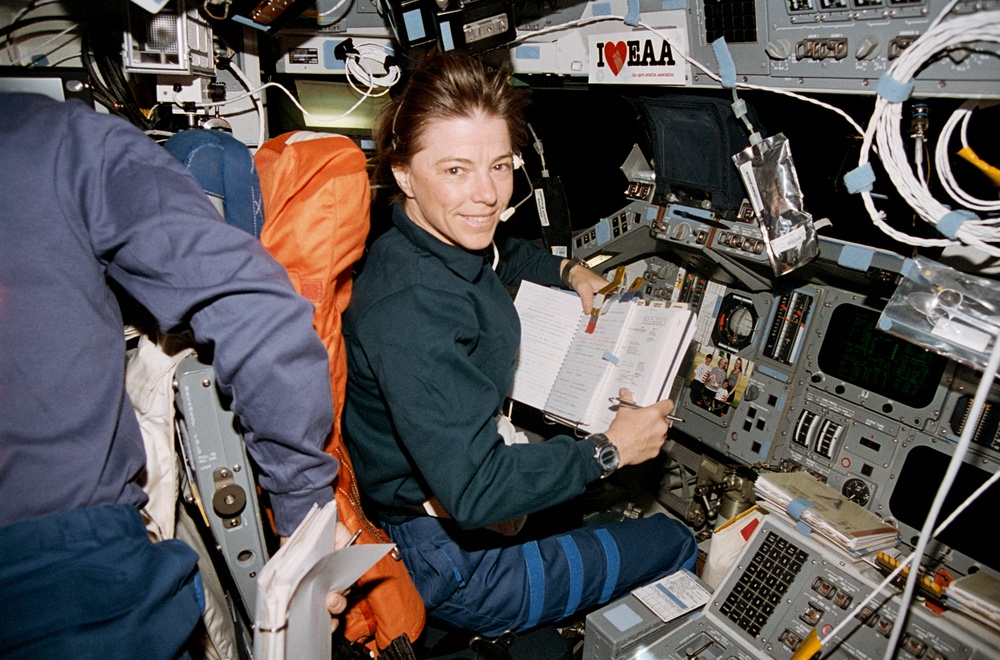 Dunbar reviews checklist on forward flight deck