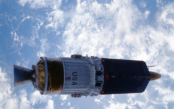 TDRS-E in the payload bay of Atlantis and deployed
