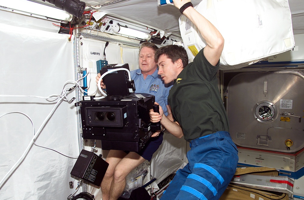 Expedition One crewmembers with IMAX camera