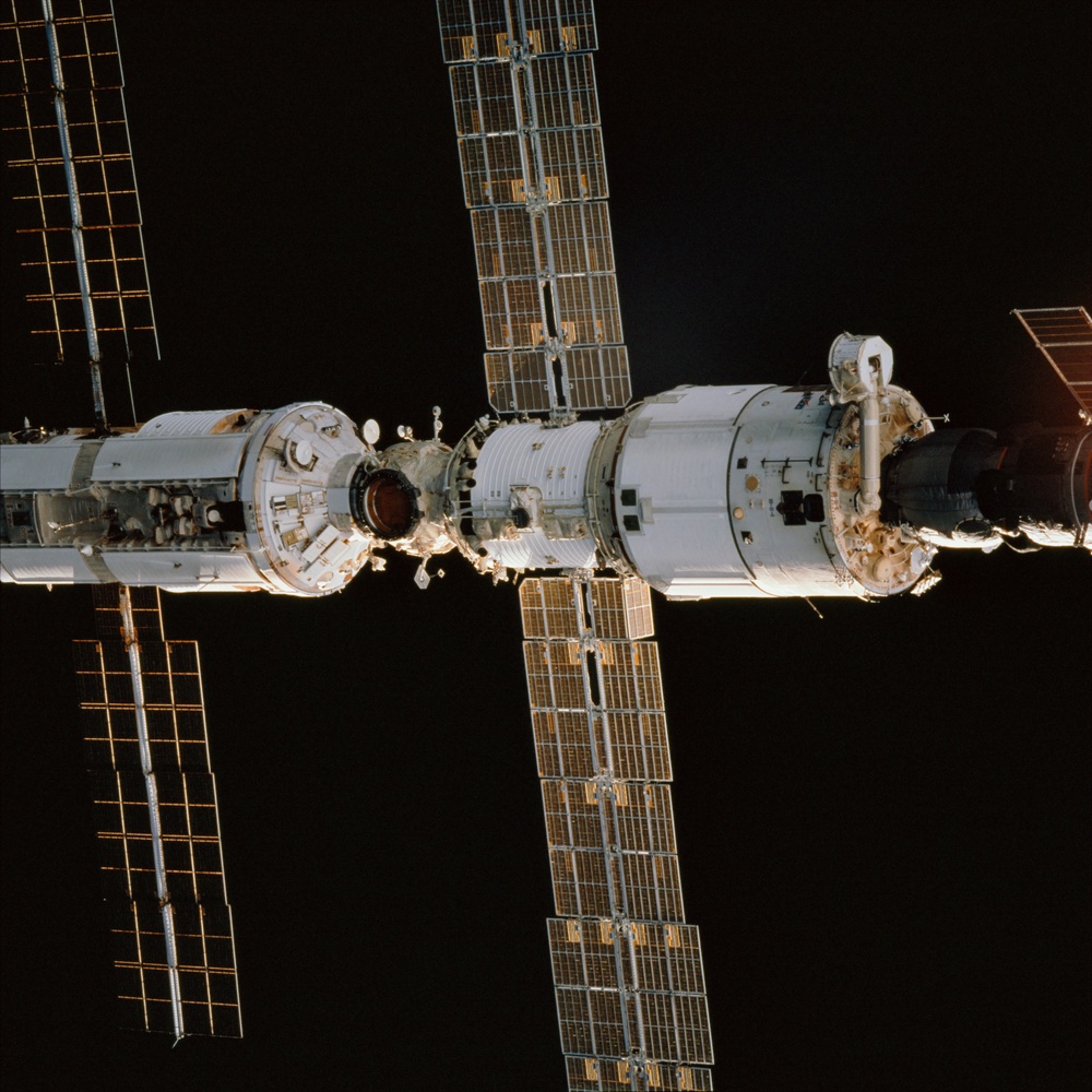 View of Zvezda, Zarya and Progress during the initial fly around of STS-106