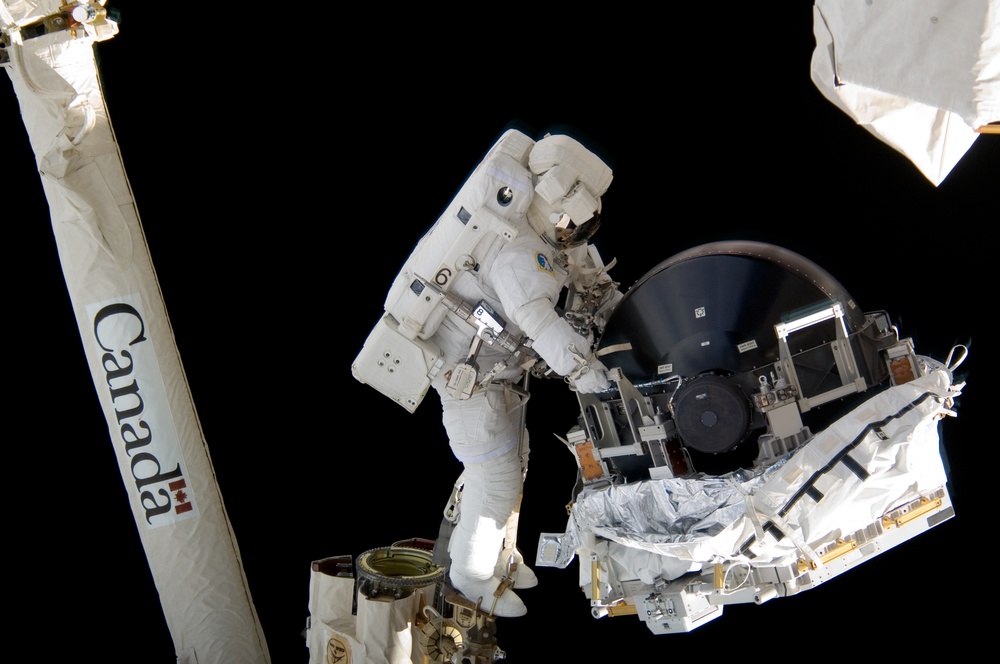 View of MS Williams transporting the new CMG to the ESP2 during EVA 2
