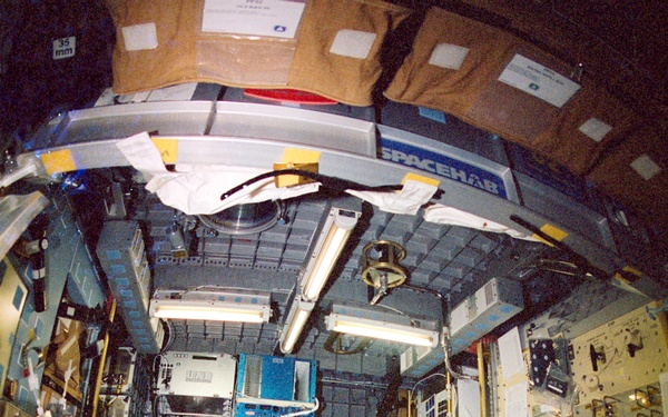 Brown works at the CM-2 in the Spacehab RDM during STS-107
