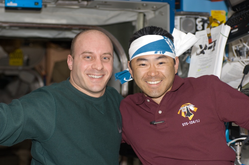 Reisman and Hoshide in U.S. Lab during Kibo installation during EVA 1