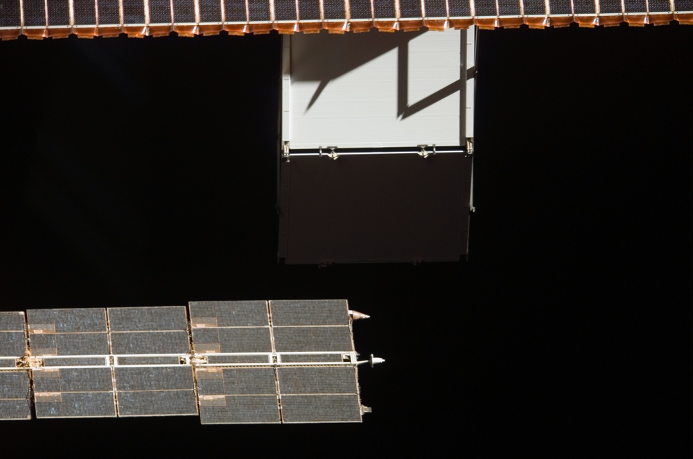 View of Solar Arrays taken from the orbiter after undocking from the ISS during  STS-121