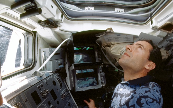 Various view with fish-eye lens of STS-103 crew on aft flight deck