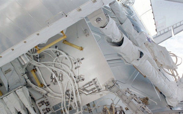 View of the aft avionics tray between the Z1 and S0 Trusses taken during the fourth EVA of STS-110