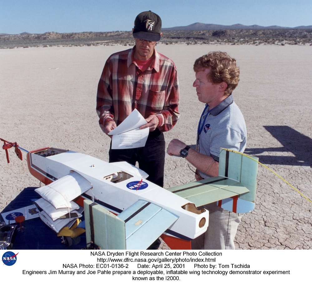 Engineers Jim Murray and Joe Pahle prepare a deployable, inflatable wing technology demonstrator exp
