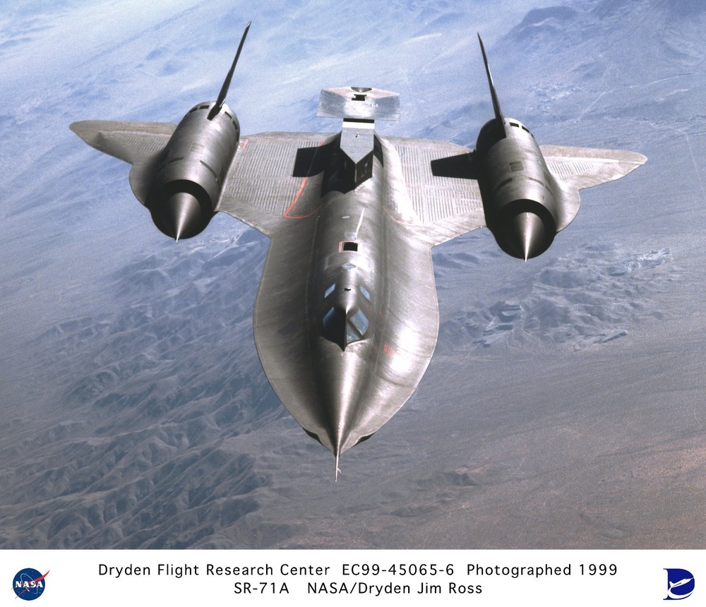 SR-71A in Flight with Test Fixture Mounted Atop the Aft Section of the Aircraft