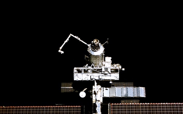 Forward - zenith view of the ISS taken during STS-110's undocking and final flyaround