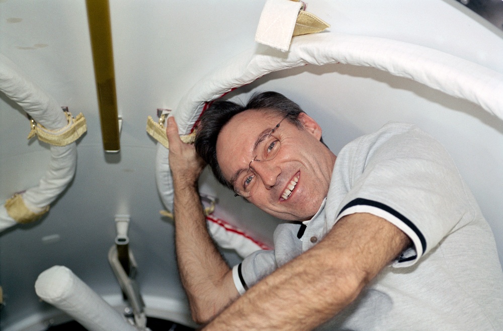 Walz poses in the Crew Lock of the Airlock during STS-110's mission