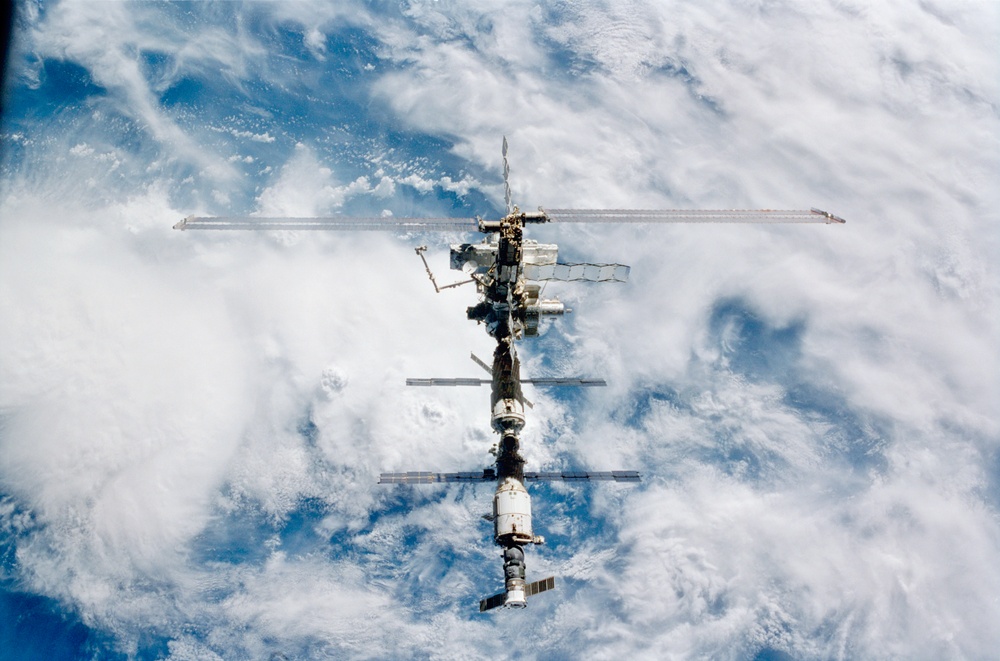 Zenith view of the ISS taken during STS-110's undocking and final flyaround