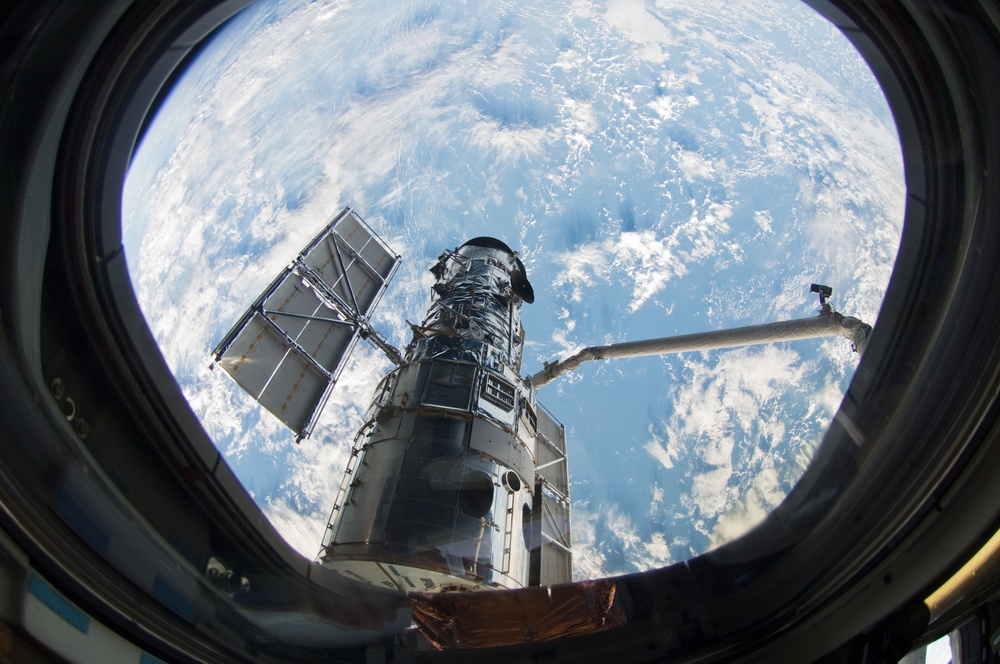 Hubble Space Telescope (HST) during rendezvous with STS-125 Shuttle Atlantis