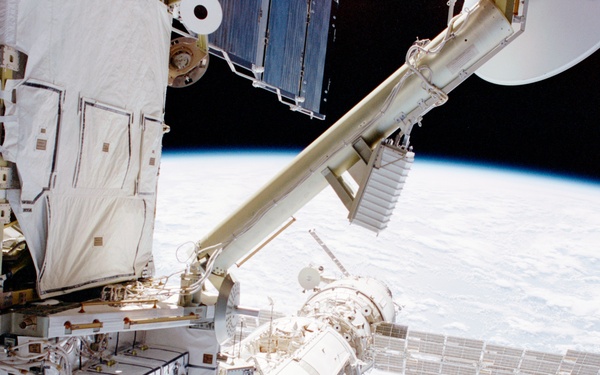 View of the port side of the Z1 Truss, Zarya and Zvezda taken during the first EVA of STS-100