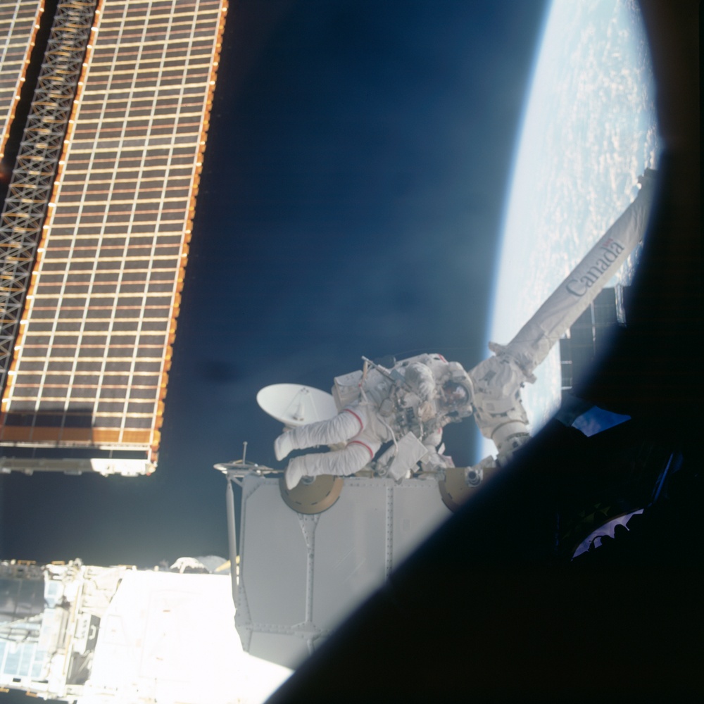 MS Hadfield works on the SLP during the second EVA of STS-100