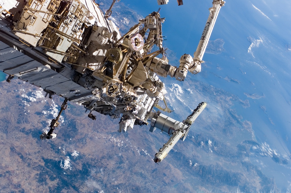 MacLean and Burbank performing second EVA spacewalk