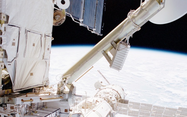 View of the port side of the Z1 Truss, Zarya and Zvezda taken during the first EVA of STS-100