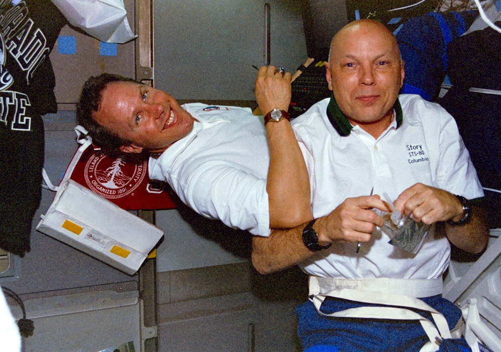 Crewmember activities in the shuttle middeck