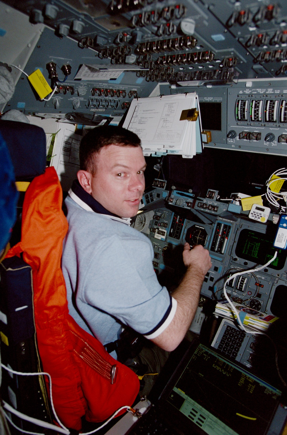 Various crewmembers in the orbiter flight deck