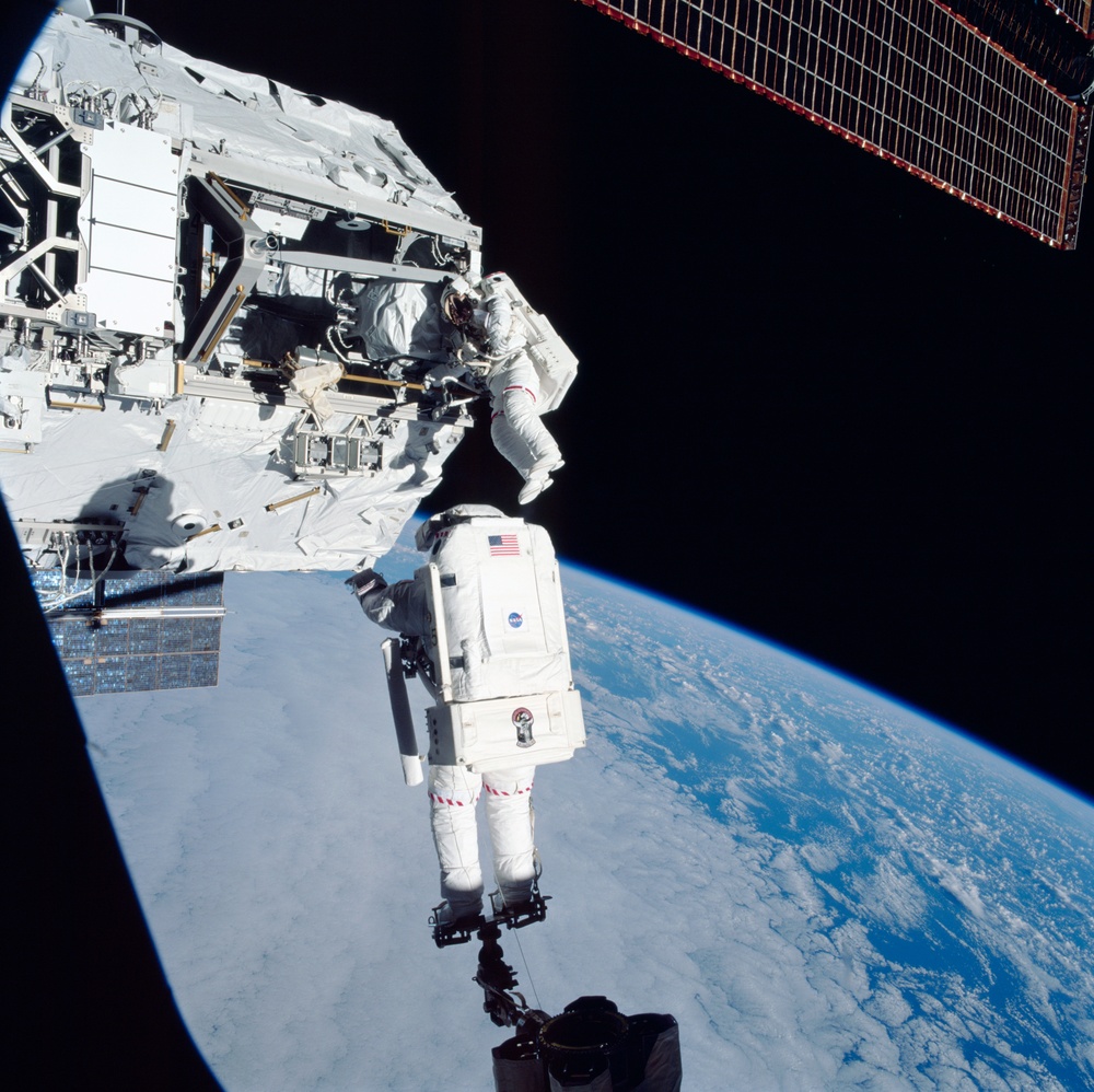 Morin and Ross work during the second EVA of STS-110