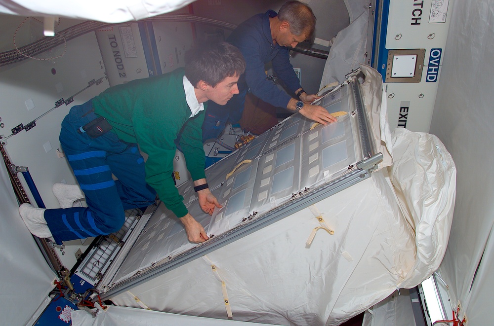 Installation of Zero-g Stowage Rack in U.S. Laboratory / Destiny module