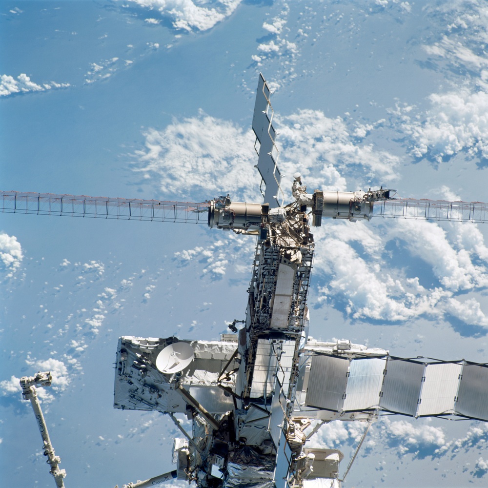 View of the aft - zenith side of the ISS taken during STS-110's flyaround