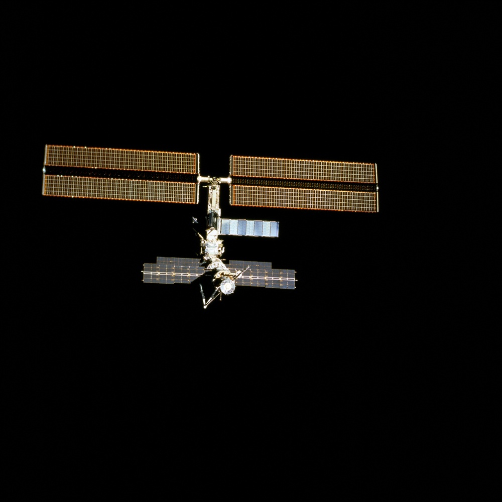 Aft view of the ISS taken during the final flyaround of the STS-100 mission