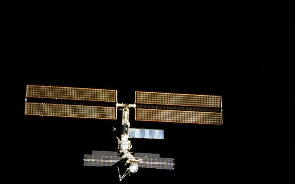 Aft view of the ISS taken during the final flyaround of the STS-100 mission