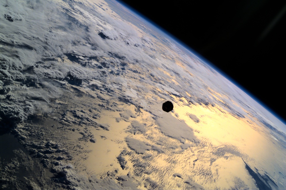 PANSAT satellite deployment from STS-95 Discovery's payload bay