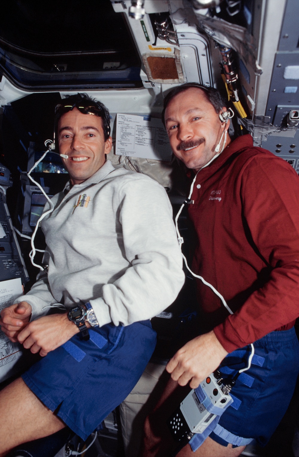 Various views of the STS-103 crew on the flight deck