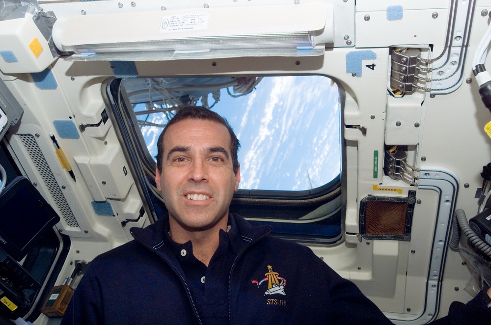 MS Mastracchio posing for a photo on the Endeavour during the STS-118 Mission