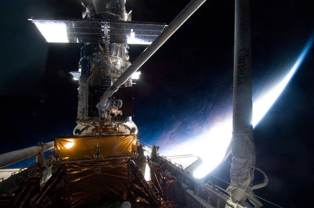 STS-125 MS1 Good and MS4 Massimino during EVA4