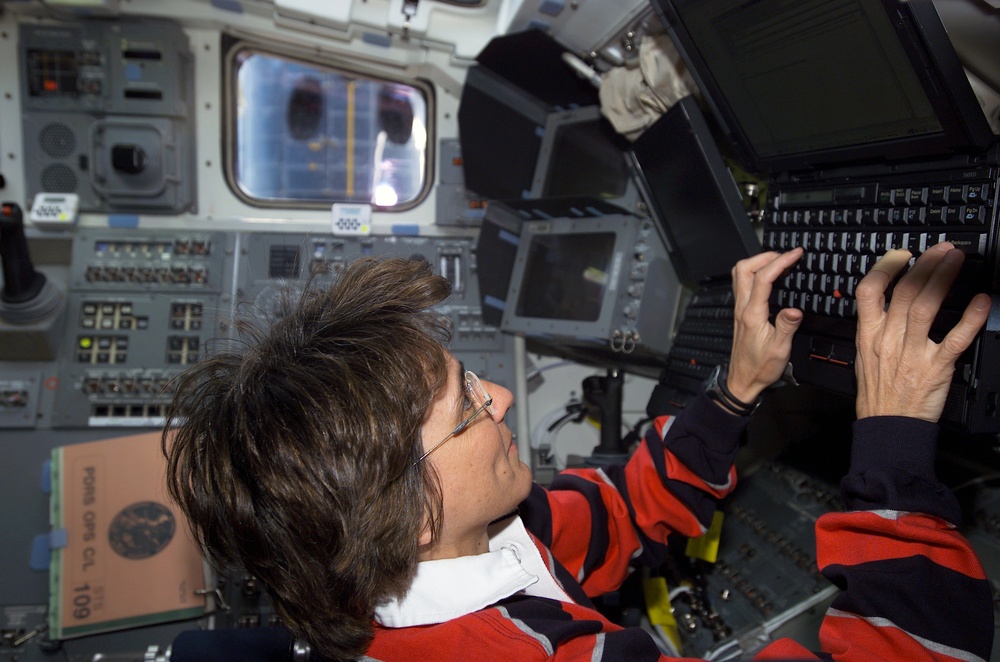 STS-109 MS Currie on aft flight deck