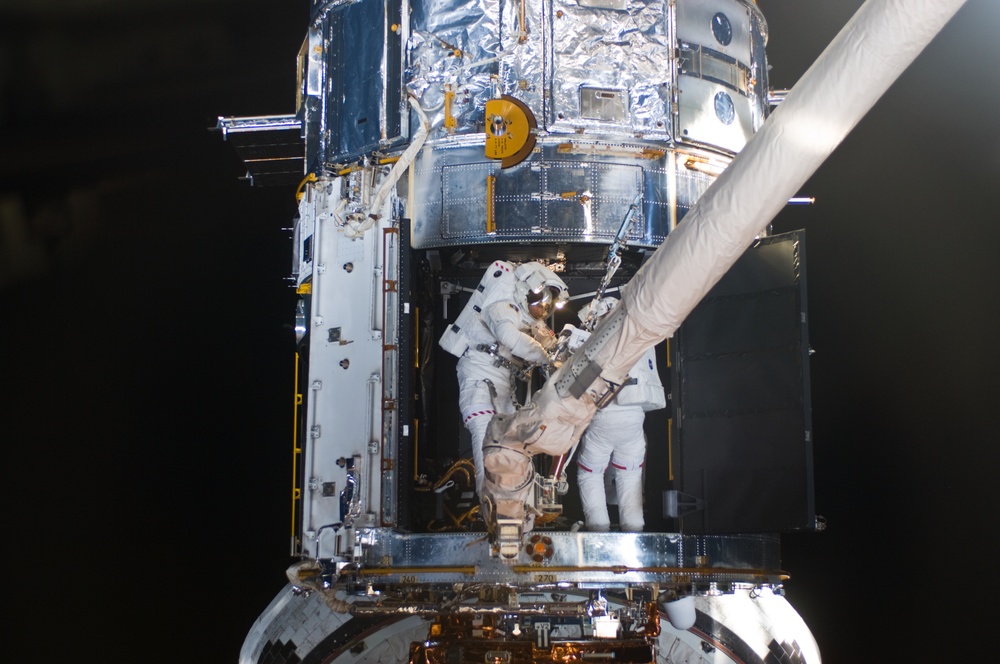 STS-125 MS1 Good and MS4 Massimino during EVA4