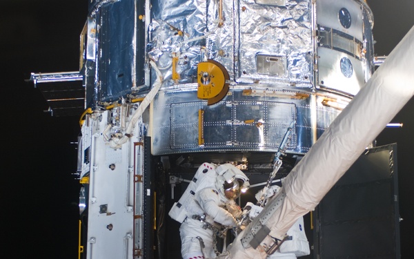 STS-125 MS1 Good and MS4 Massimino during EVA4