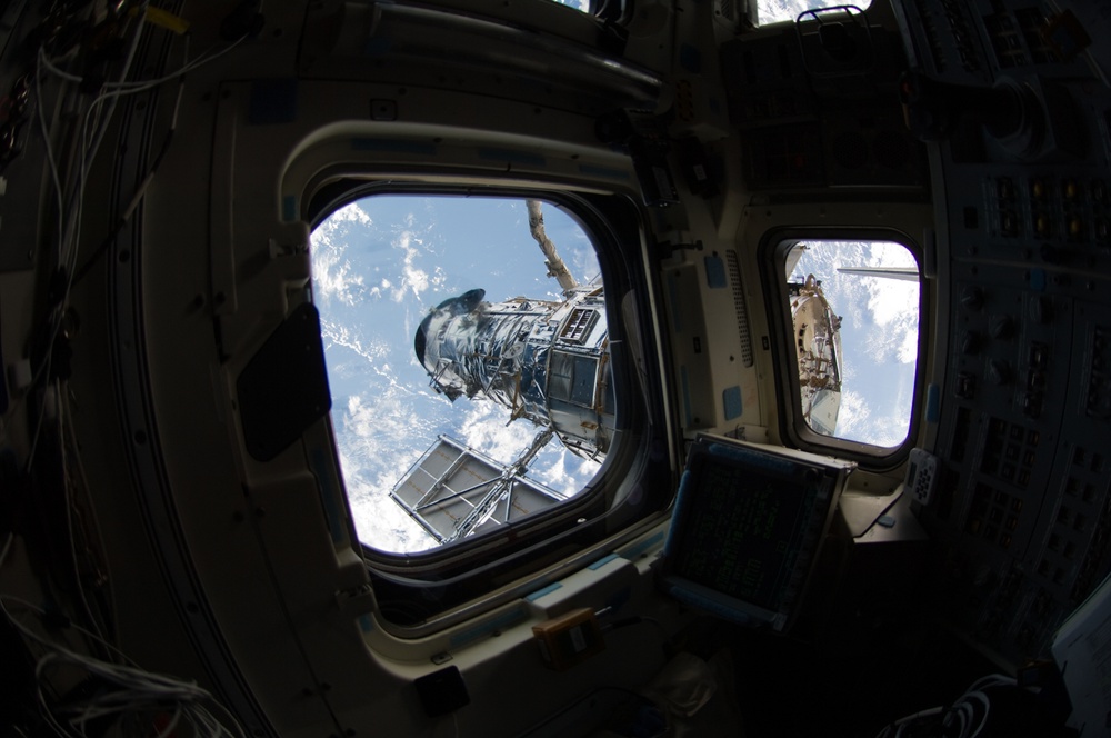 Hubble Space Telescope (HST) during rendezvous with STS-125 Shuttle Atlantis