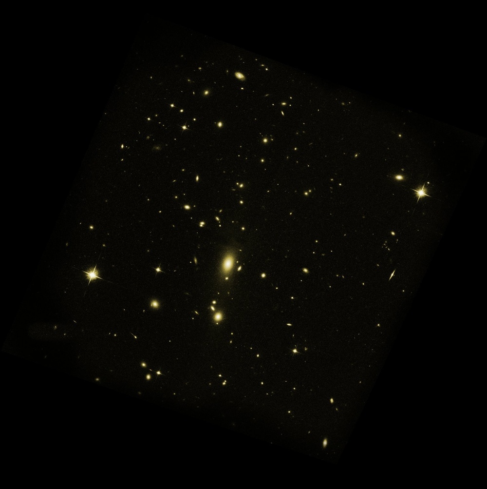 Host Galaxy Cluster to Largest Known Radio Eruption