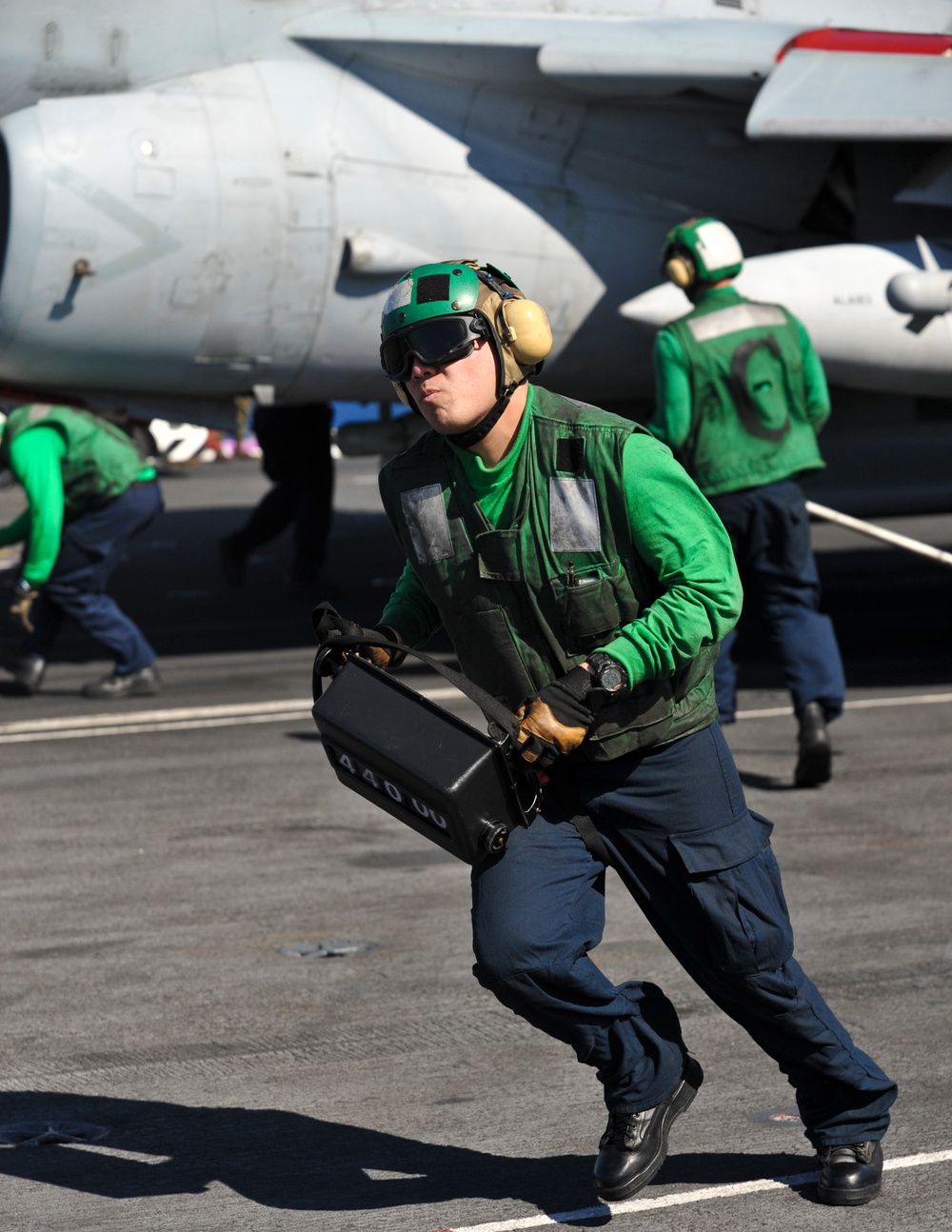 USS Nimitz crew works aboard flight deck